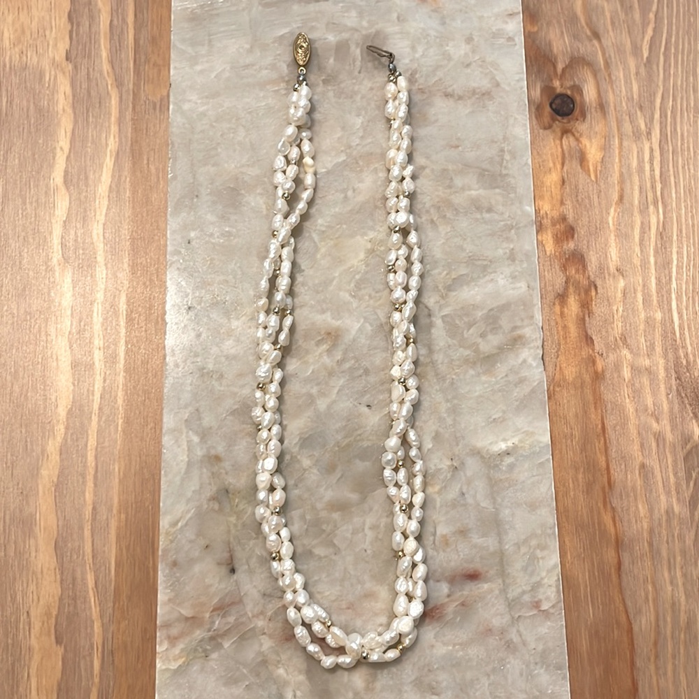 Triple strand of freshwater pearls necklace